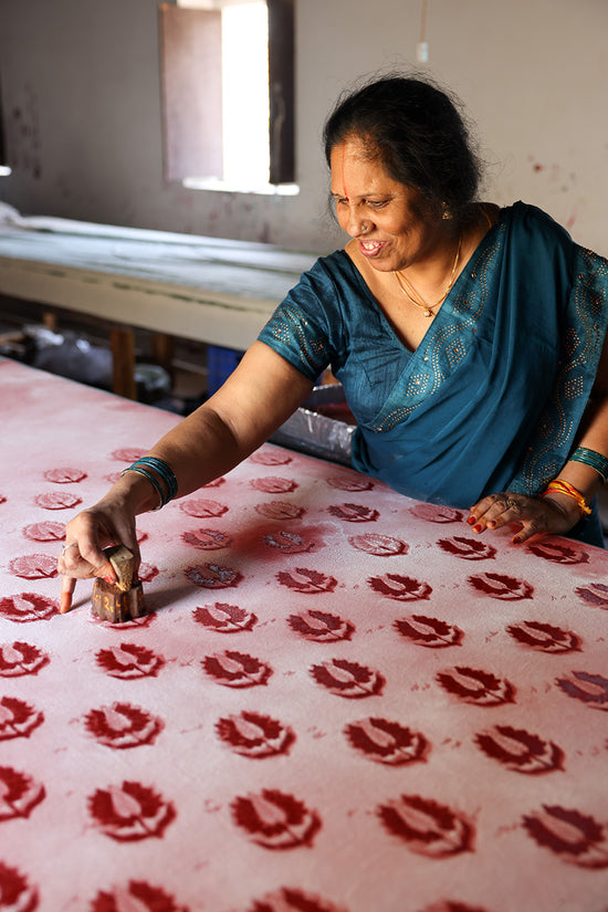 Ria Blouse Ruby Red — artisan block printing process, ruby red botanical leaf motif hand stamped onto cotton fabric, traditional Sanganer Jaipur block printing technique India | Daughters of India