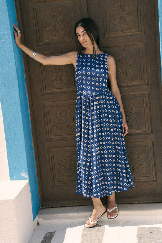 Veda Dress Indigo — close-up neckline and sleeve detail, indigo hand block print linen blend fabric with botanical motif, square neckline and puff sleeve styling, artisan Jaipur India | Daughters of India